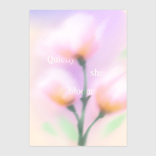 Quietly she blooms